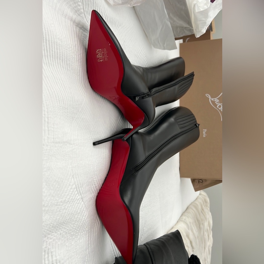 Christian Louboutin, boots new with box and bags !!!